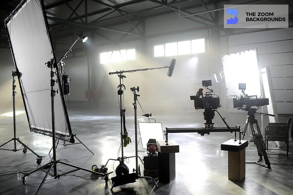 Focused Studio Camera and Equipment Silhouette Behind Shooting Zoom Ba