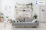 blurred trendy living room with a grey sofa zoom background