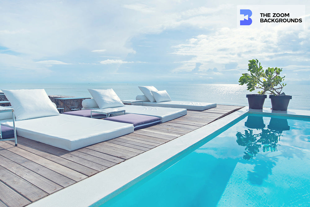 luxury pool with white beach chairs zoom background