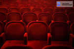 vacant red theatre seats zoom background